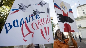 Belarusian demonstrators protest Russian air base